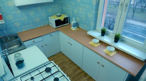 Kuchnia po odświeżeniu (na podłodze wykładzina imitująca panele)